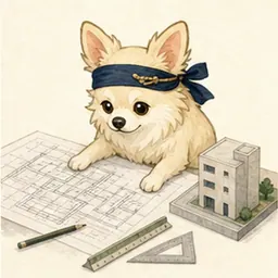建築図面と模型を確認するチワワ