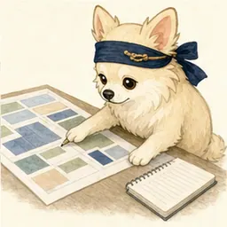 事業計画のカードを整理するチワワ